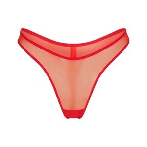 SKIMS ULTRA FINE MESH THONG IN POPPY